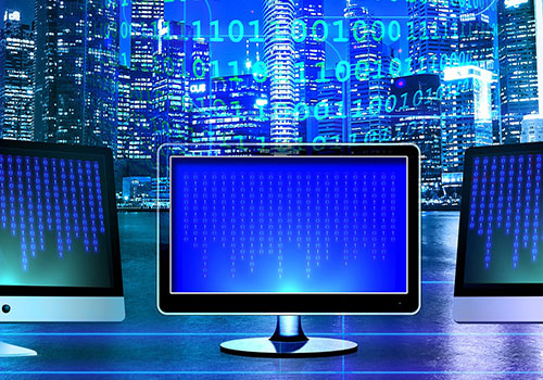 three computer with blue background